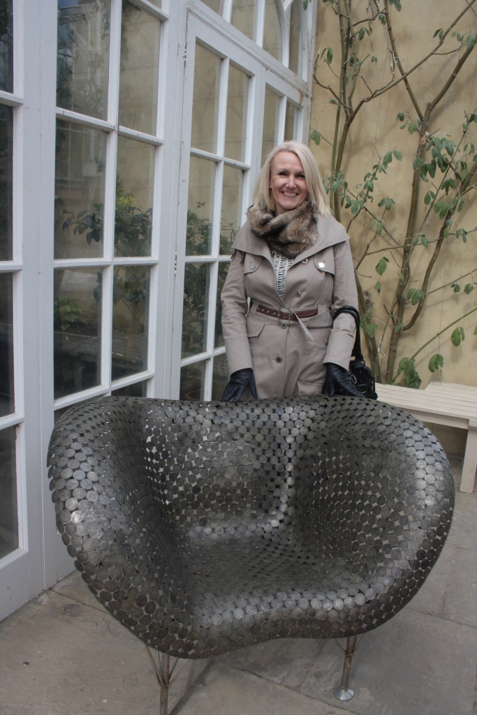 Mum with a chair made of penny's